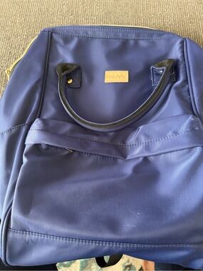 Mouvo Navy Blue Backpack with Tan Logo Patch